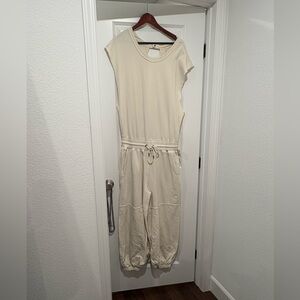 Free People Throw and Go onesie - tags on never worn. ivory Medium